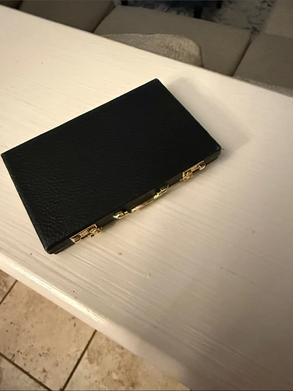Source Unknown compact black